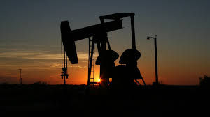 Oil slips on economic slowdown, as OPEC-led cuts still support
