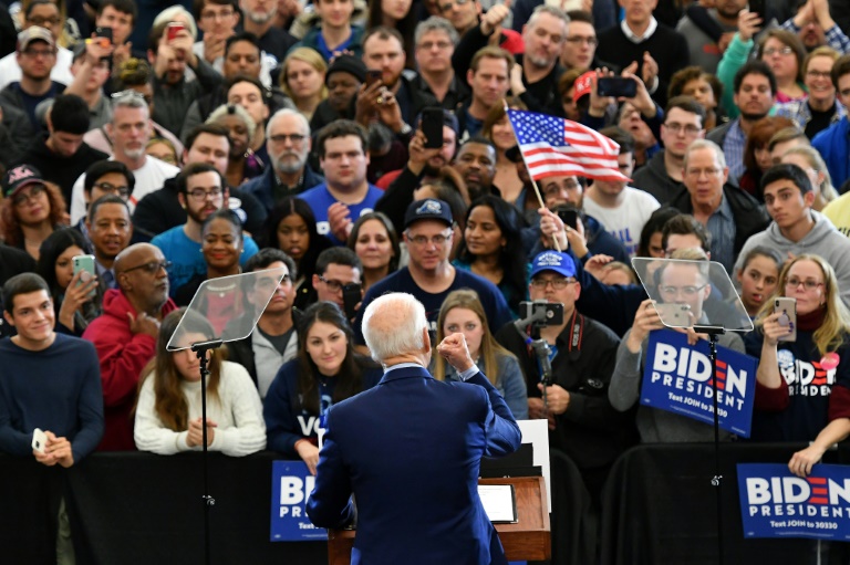 Voting begins in six states as Biden-Sanders showdown heats up