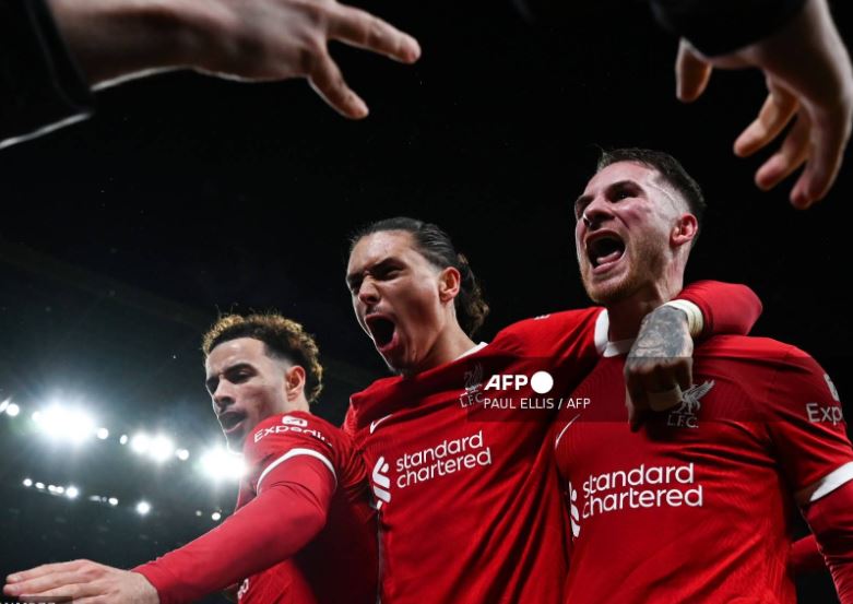Liverpool faces a pivotal test in their pursuit of the Premier League title as they clash with Manchester United, aiming to inch closer to matching their rival’s record of 20 English championships.