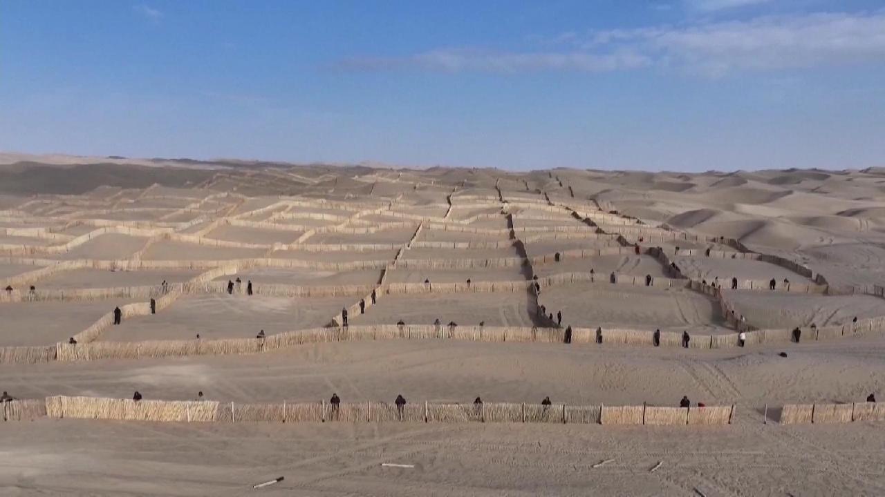 China’s largest desert fully encircled with green belt